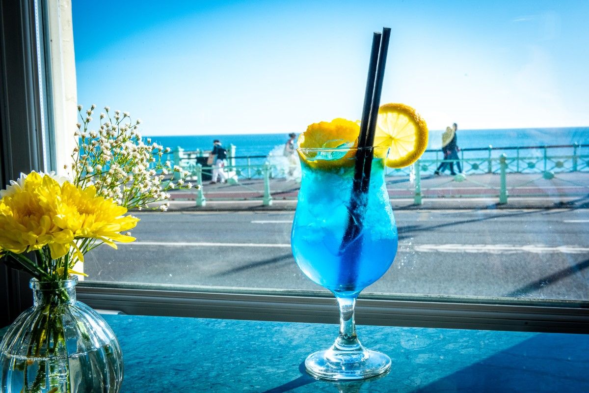 Blue cocktail and sea view (Custom)